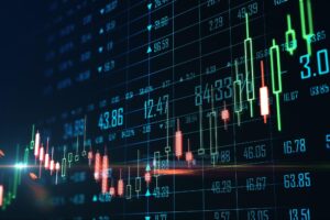 Image of financial data and a trading candlestick chart illustrating forex trading mechanics.