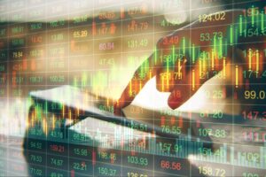 Image shows index trading basics like instrument prices with an image of someone tapping a phone overlaid.